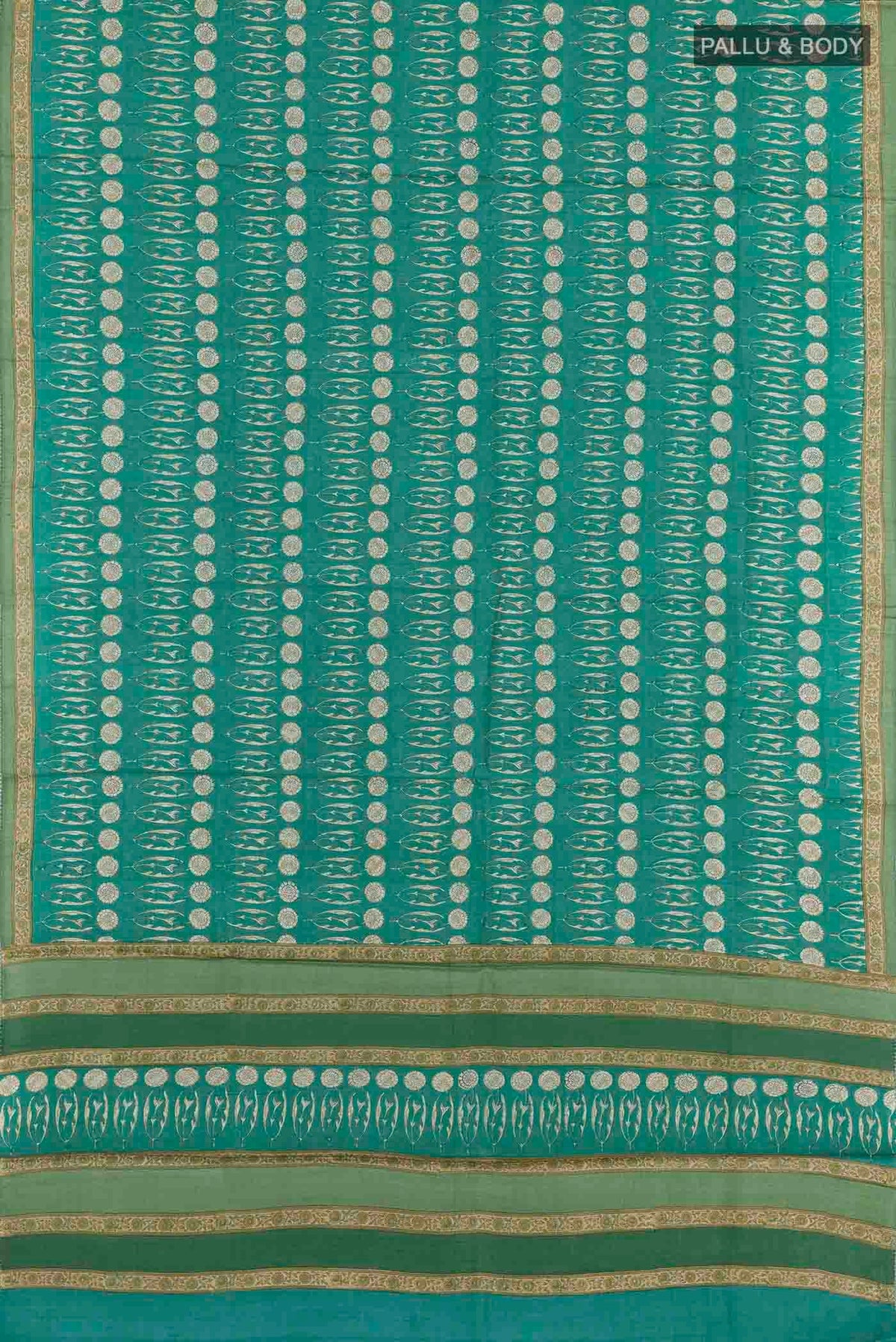 Flat view of Green Tussar Saree with Printed design on the body and Printed Border. 