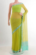 Green Mysore Chiffon Saree with Embroidery on the body and Zari Border.  displayed on a mannequin