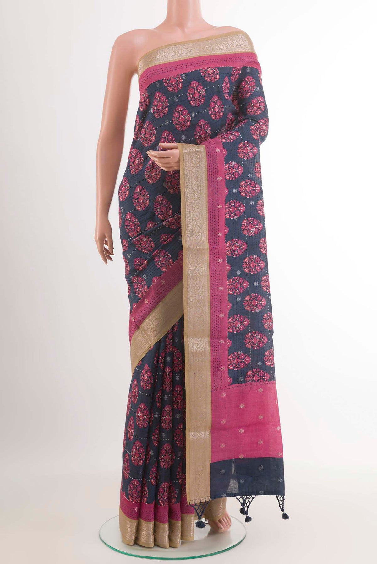 Blue Tussar Saree with Printed design on the body and Zari Border.  displayed on a mannequin