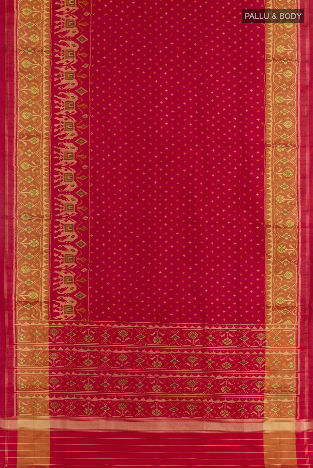 Flat view of Red Rajkot Patola Silk Saree with Ikat design on the body and Zari Border. 