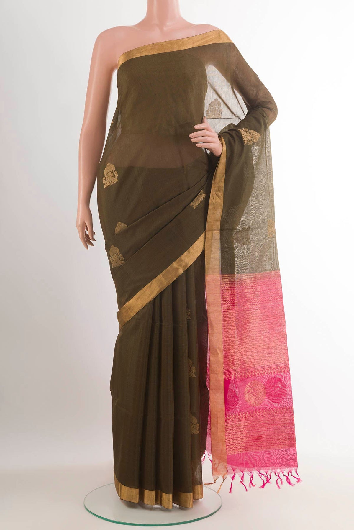 Brown Blended Kota Cotton Saree with Zari Butta on the body and Zari Border.  displayed on a mannequin