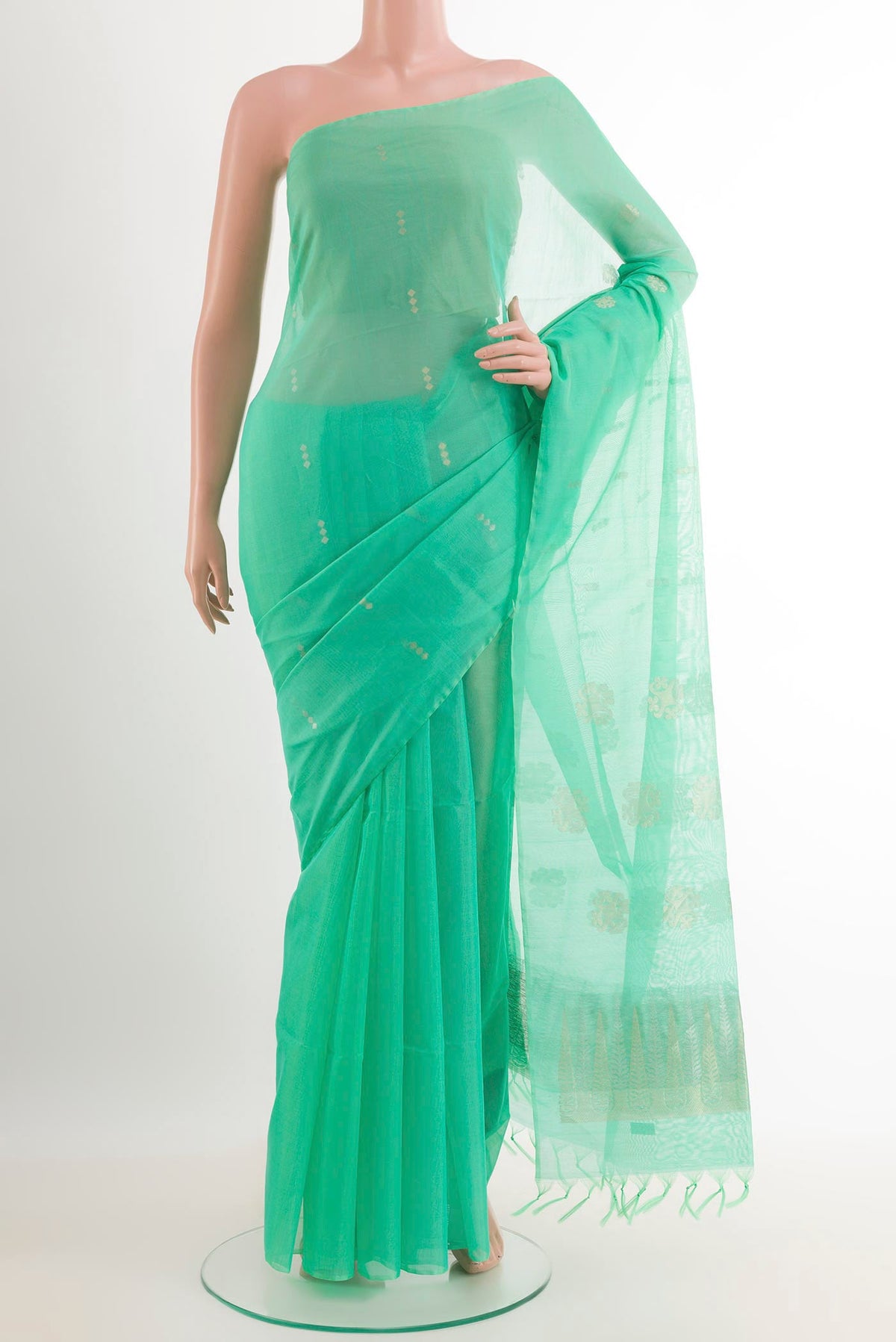 Sea Green Blended Kota Cotton Saree with Zari Butta on the body and Zari Border.  displayed on a mannequin