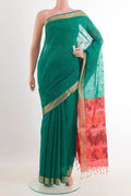 Green Blended Kota Cotton Saree with Zari Butta on the body and Zari Border.  displayed on a mannequin