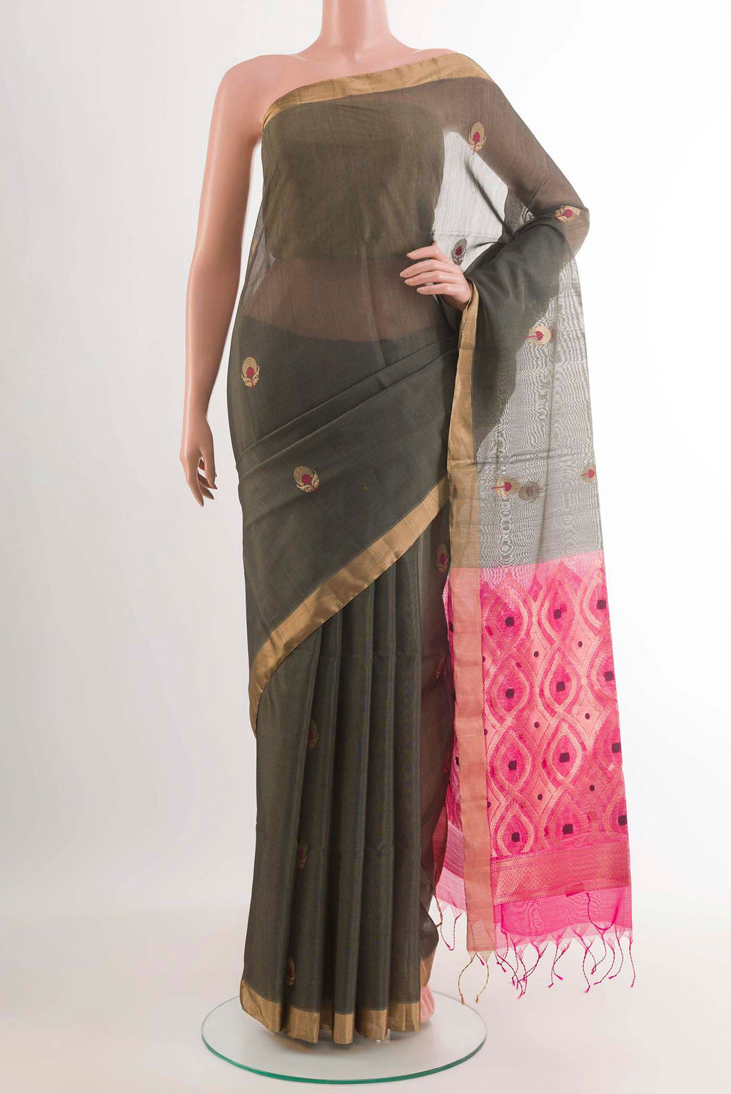 Grey Blended Kora Cotton Saree with Zari Butta on the body and Zari Border.  displayed on a mannequin