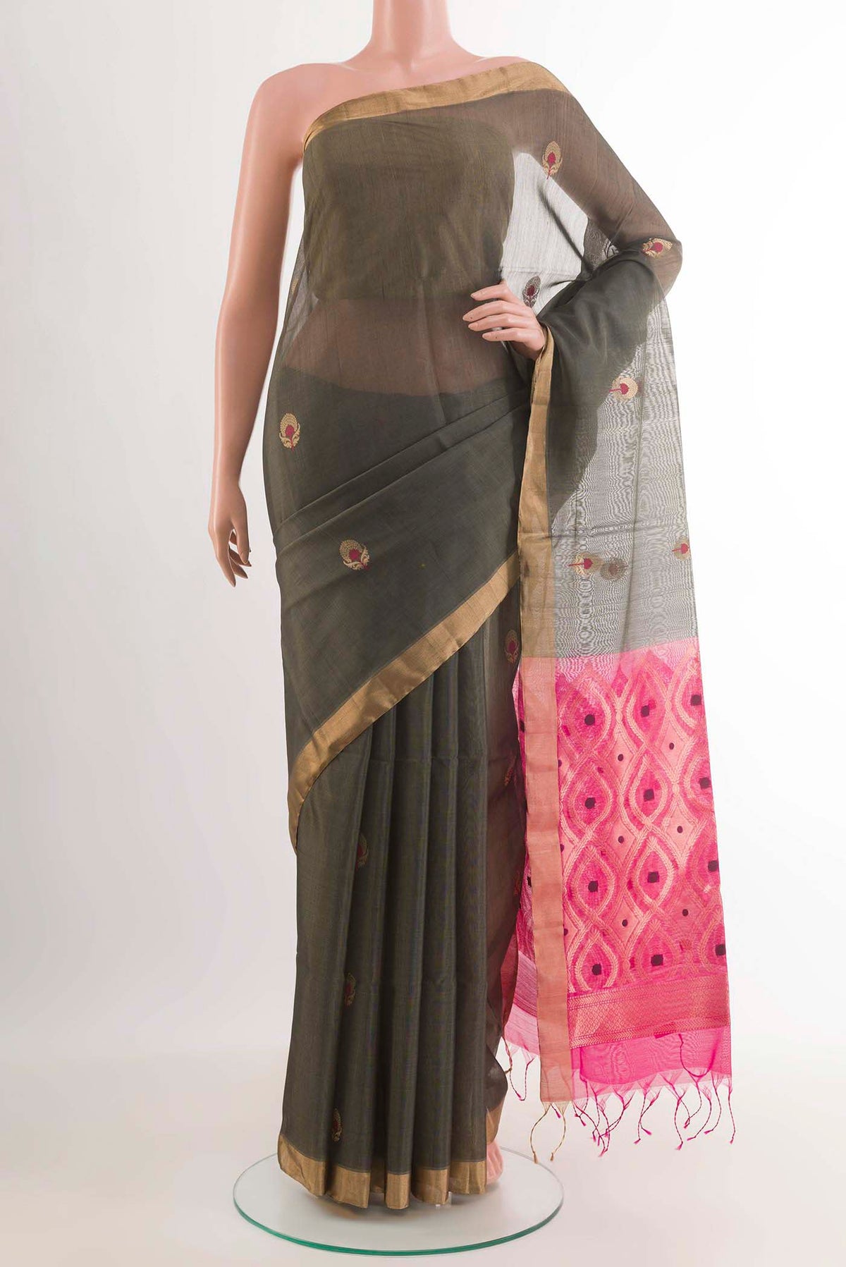 Grey Blended Kora Cotton Saree with Zari Butta on the body and Zari Border.  displayed on a mannequin