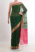 Green Blended Chanderi Kora Silk Saree with Zari Butta on the body and Zari Border.  displayed on a mannequin