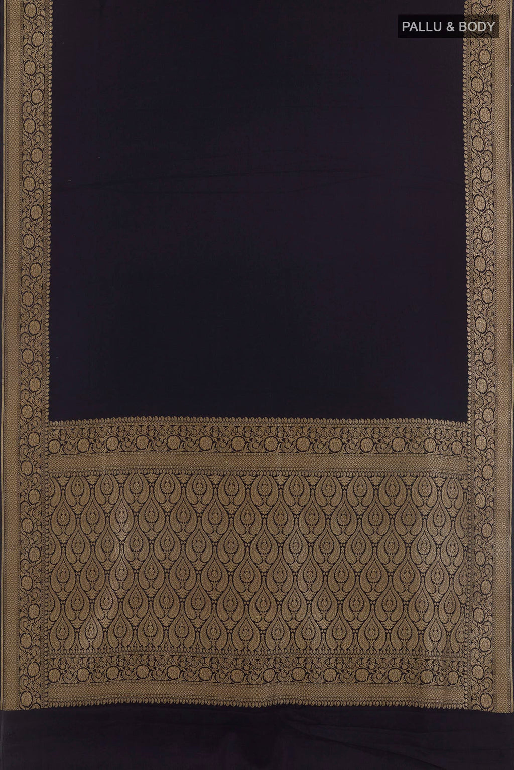 Flat view of Dark Blue Crepe Saree with Plain Body and Zari Border. 