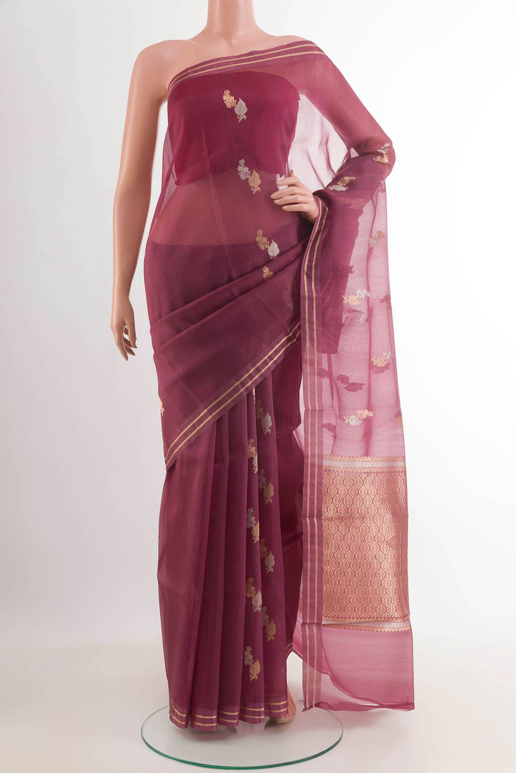Lavender Banarasi Kora Silk Saree with Zari Butta on the body and Zari Border.  displayed on a mannequin