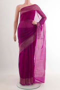 Purple Banarasi Kora Silk Saree with Zari Butta on the body and Zari Border.  displayed on a mannequin