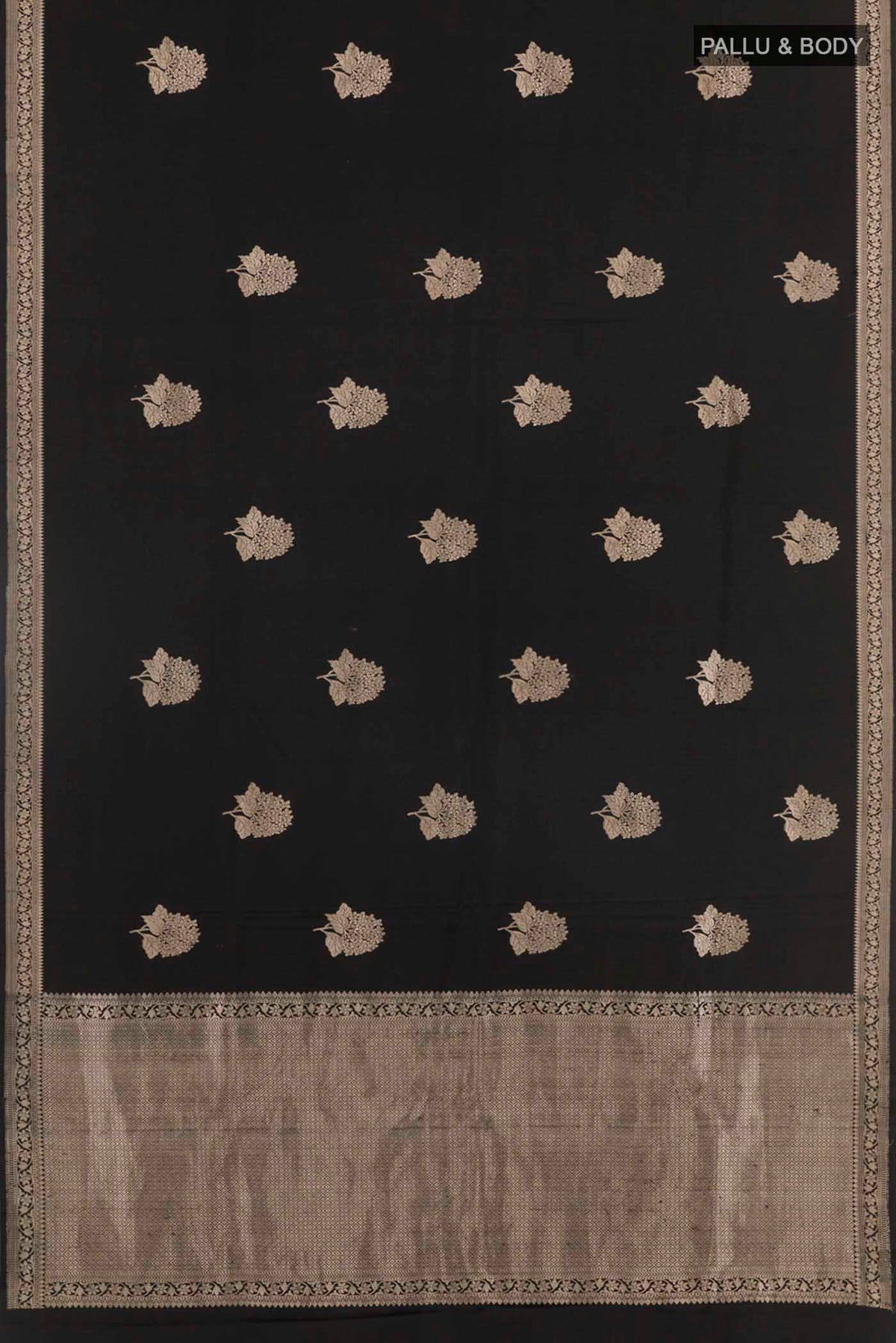 Flat view of Black Banarasi Silk Saree with Zari Butta on the body and Zari Border. 