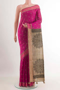 Pink Tussar Saree with Thread Butta on the body and Thread Border.  displayed on a mannequin