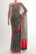 Black Mysore Chiffon Saree with Printed design on the body and Zari Border.  displayed on a mannequin