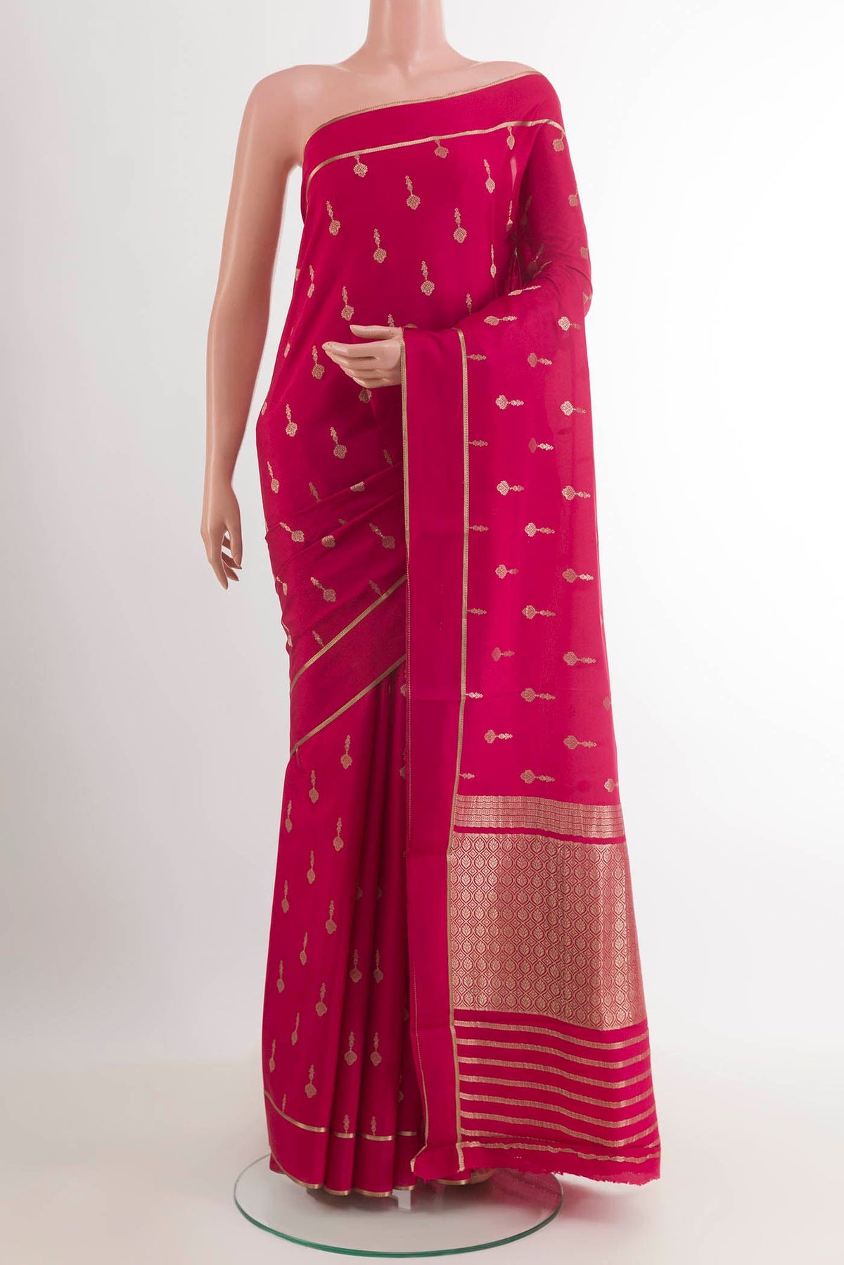 Pink Mysore Crepe Saree with Zari Butta on the body and Zari Border.  displayed on a mannequin