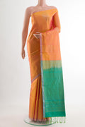 Pinkish Yellow Dual Tone Soft Silk Saree with Zari Butta on the body and Zari Border.  displayed on a mannequin