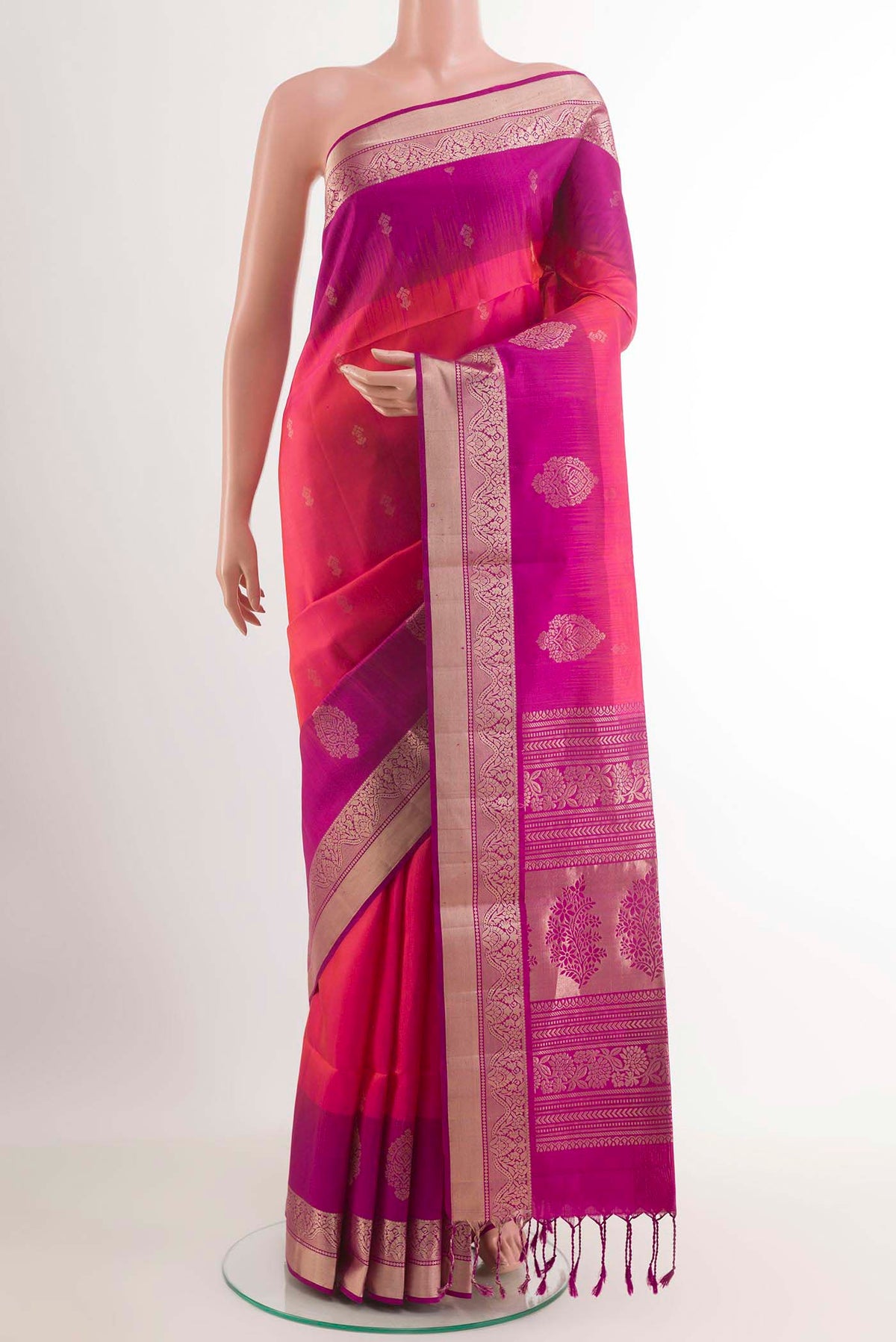 Pink Soft Silk Saree with Zari Butta on the body and Zari Border.  displayed on a mannequin