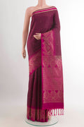 Purple Soft Silk Saree with Zari Butta on the body and Zari Border.  displayed on a mannequin