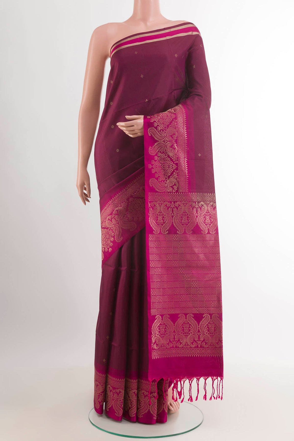 Purple Soft Silk Saree with Zari Butta on the body and Zari Border.  displayed on a mannequin