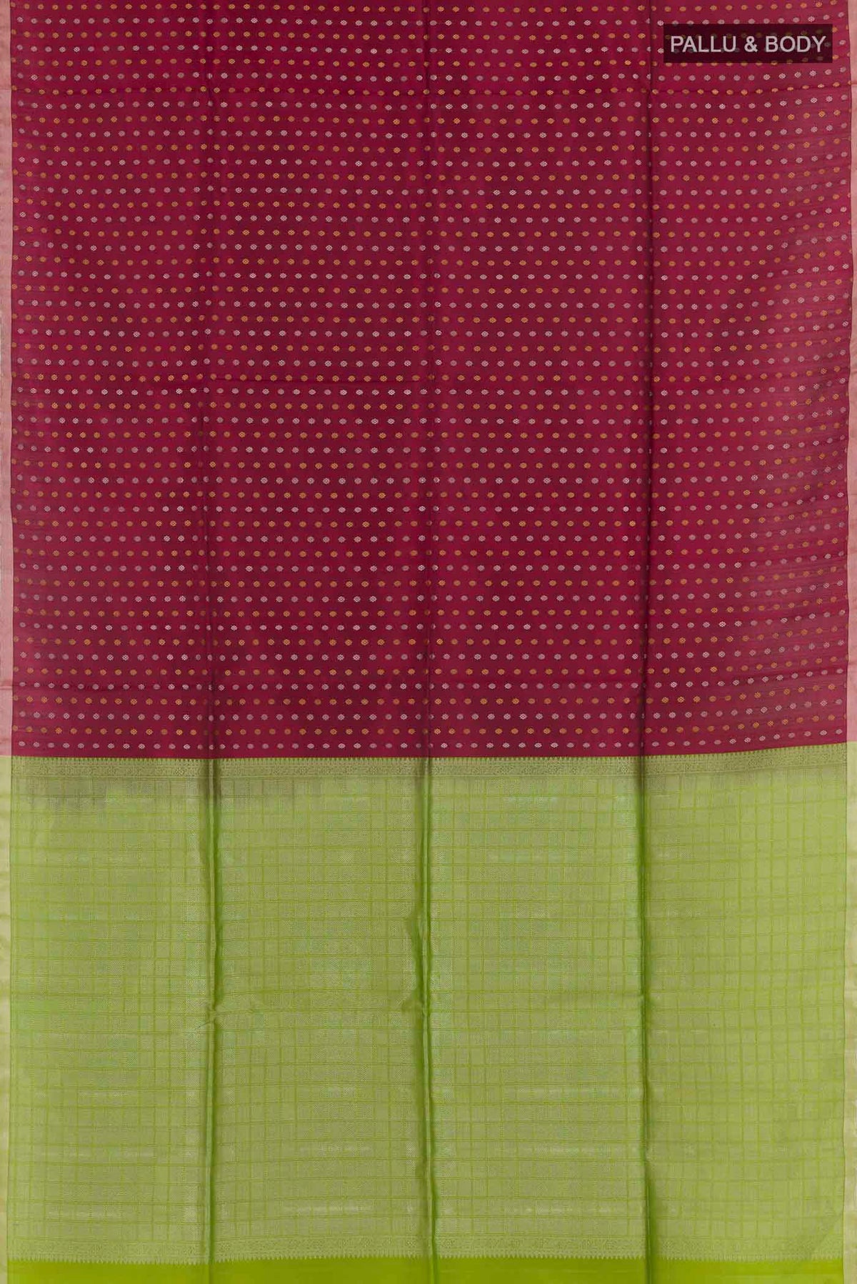 Flat view of Maroon Soft Silk Saree with Zari Butta on the body and Zari Border. 