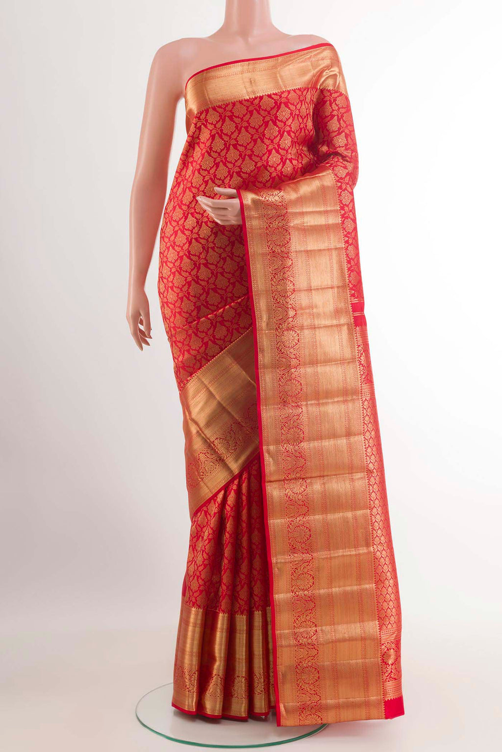 Red Kanchipuram Silk Saree with Zari Brocade on the body and Zari Border.  displayed on a mannequin