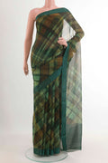 Green Mysore Chiffon Saree with Printed design on the body and Plain Border.  displayed on a mannequin