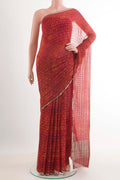 Red Mysore Crepe Saree with Zari Butta on the body and Zari Border.  displayed on a mannequin