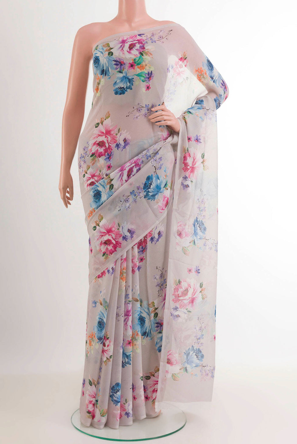 Off White Chiffon Saree with Printed design on the body and Plain Border.  displayed on a mannequin