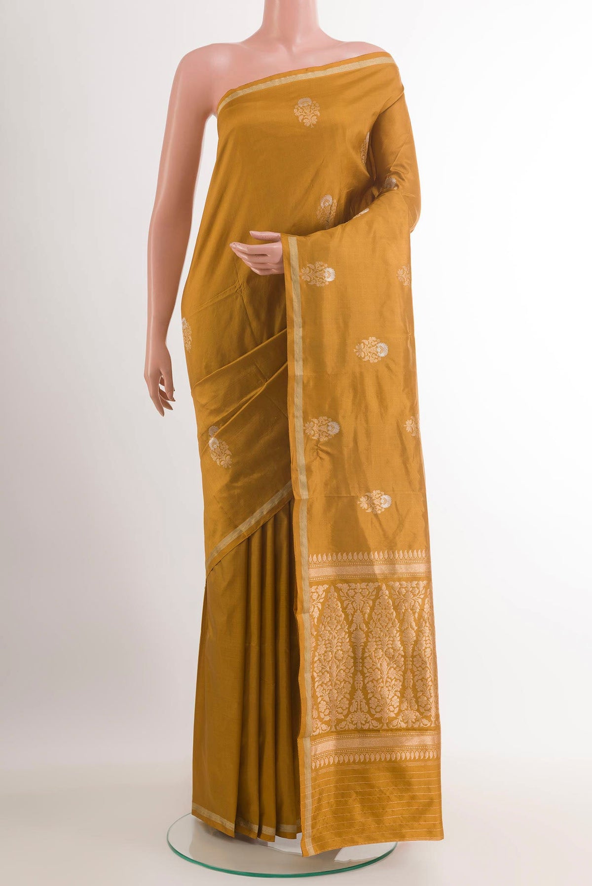 Yellow Banarasi Katan Silk Saree with Zari Butta on the body and Zari Border.  displayed on a mannequin
