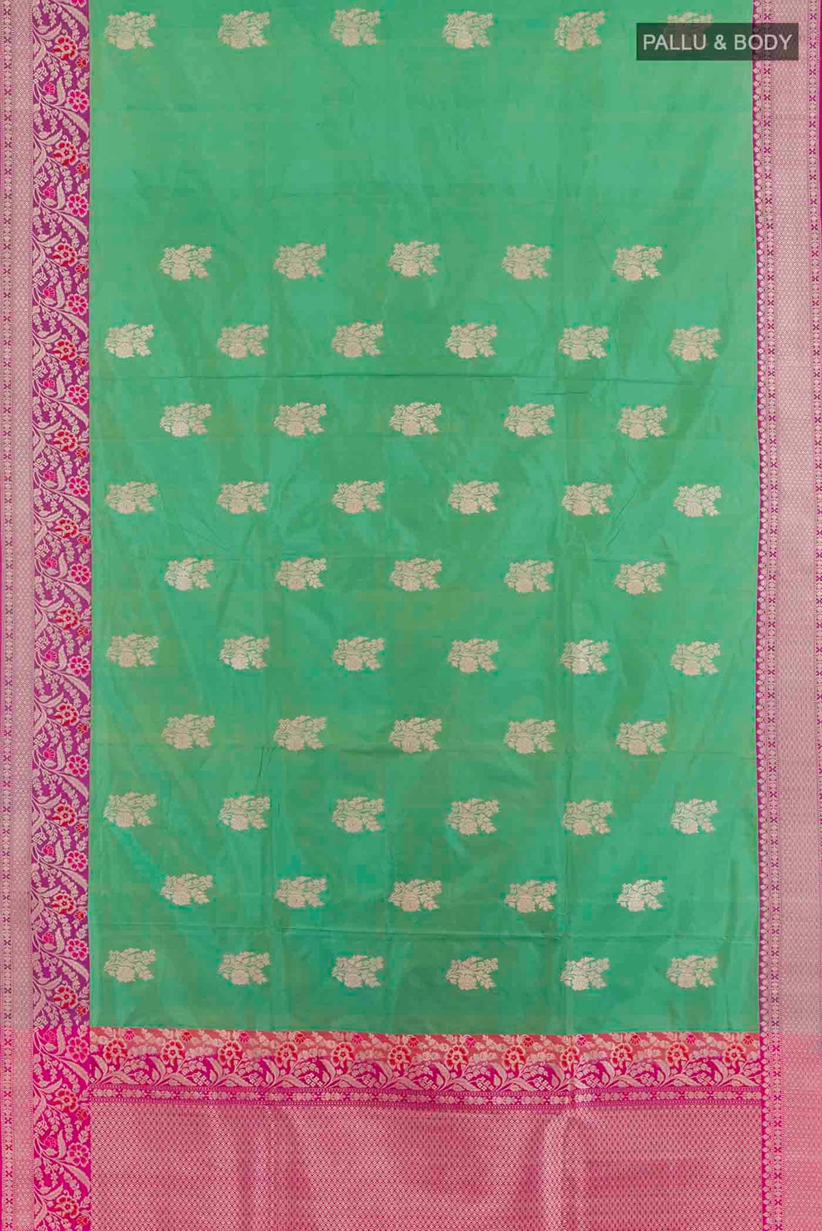 Flat view of Green Banarasi Silk Saree with Zari Butta on the body and Zari Border. 