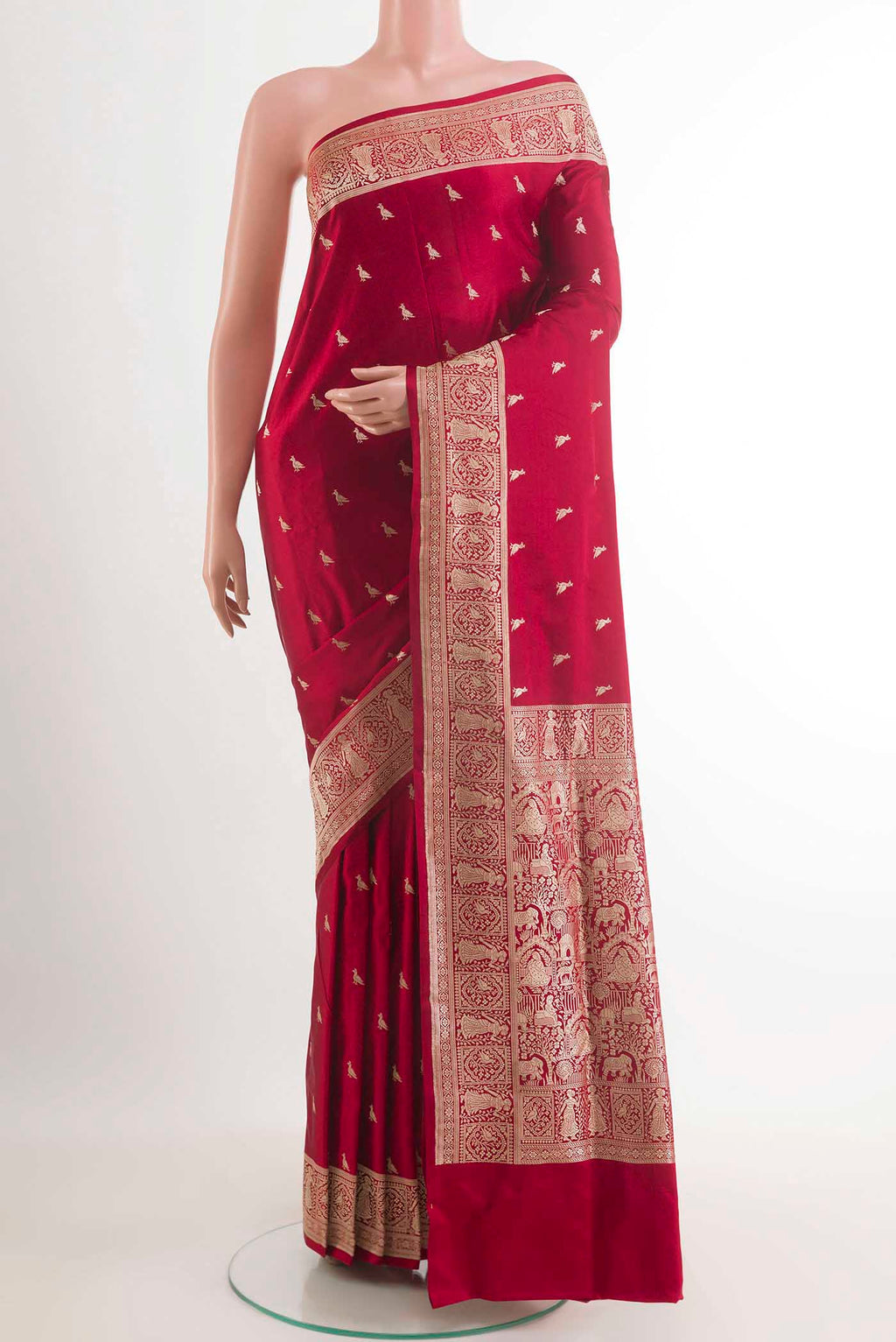 Red Banarasi Silk Saree with Zari Butta on the body and Zari Border.  displayed on a mannequin