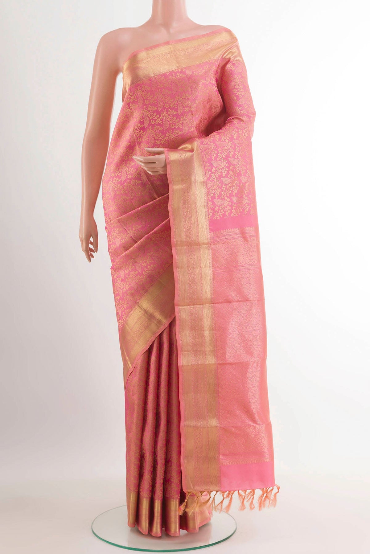 Pink Kanchipuram Silk Saree with Zari Brocade on the body and Zari Border.  displayed on a mannequin