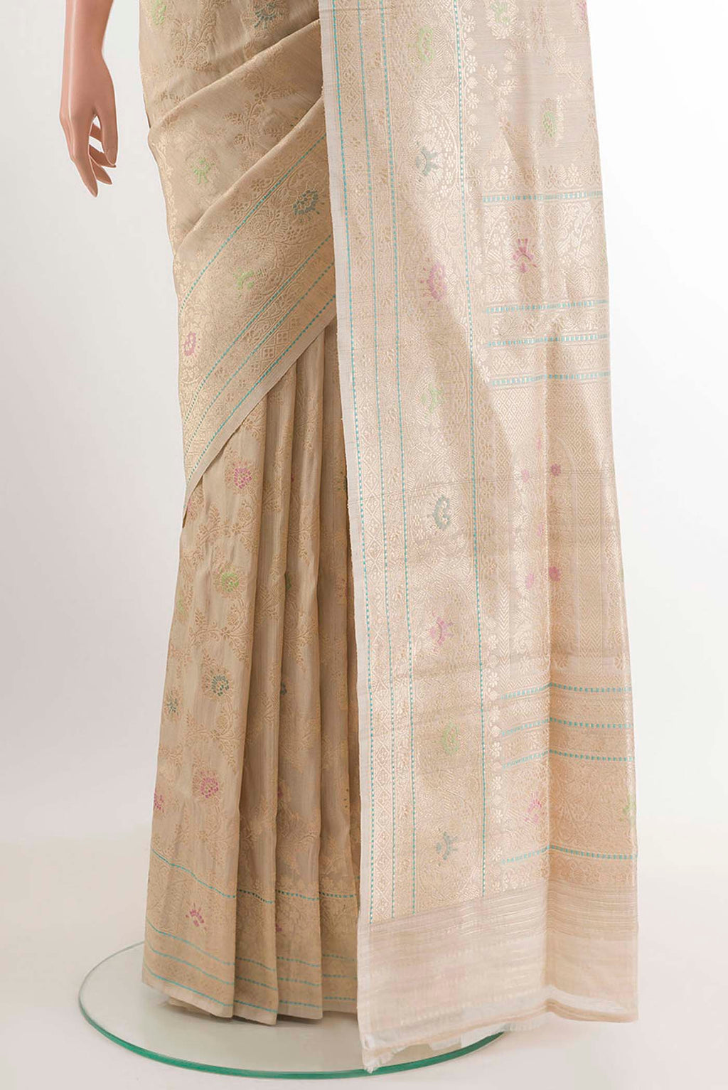 Pleats and pallu of Off White Banarasi Tussar Silk Saree with Zari Butta on the body and Zari Border. 