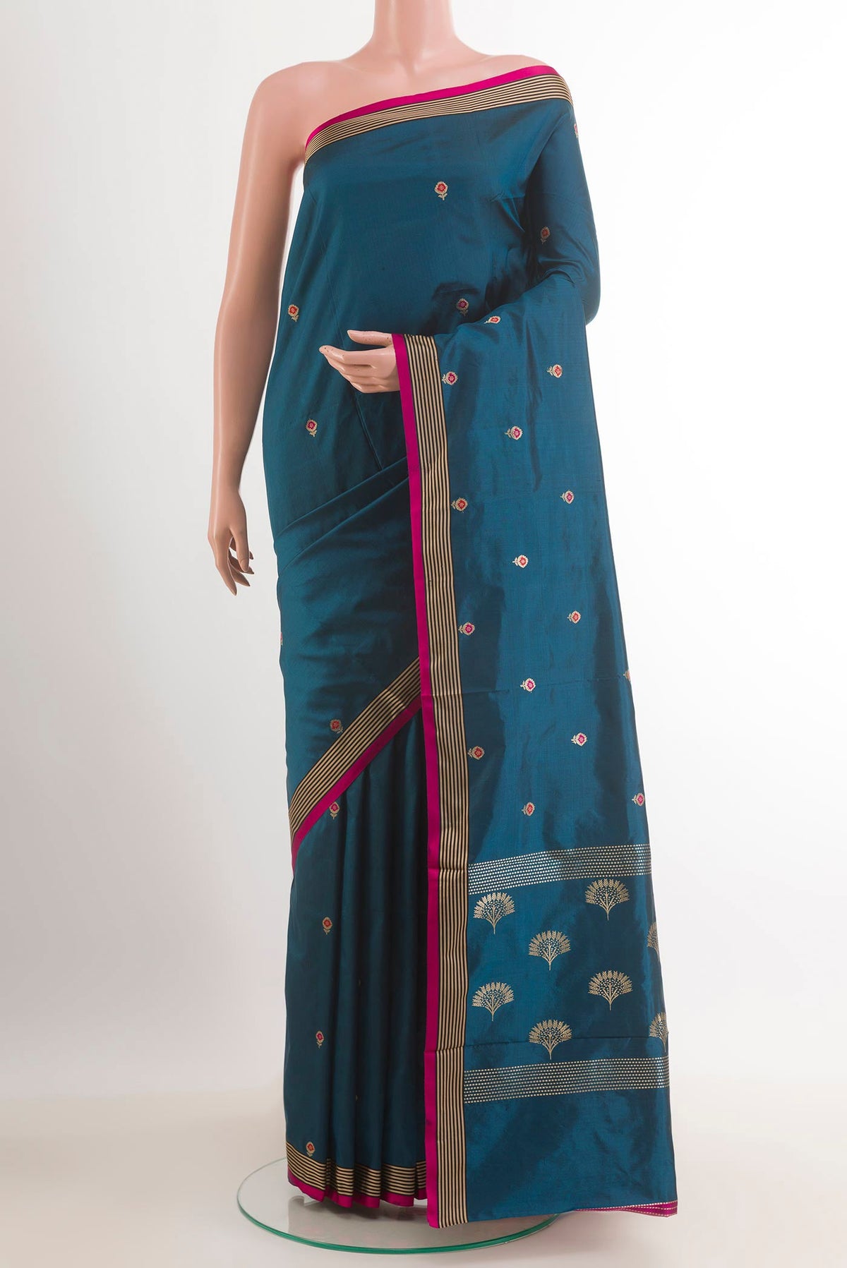 Royal Blue Banarasi Katan Silk Saree with Zari Butta on the body and Zari Border.  displayed on a mannequin