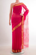 Red Blended Kora Cotton Saree with Zari Butta on the body and Zari Border.  displayed on a mannequin