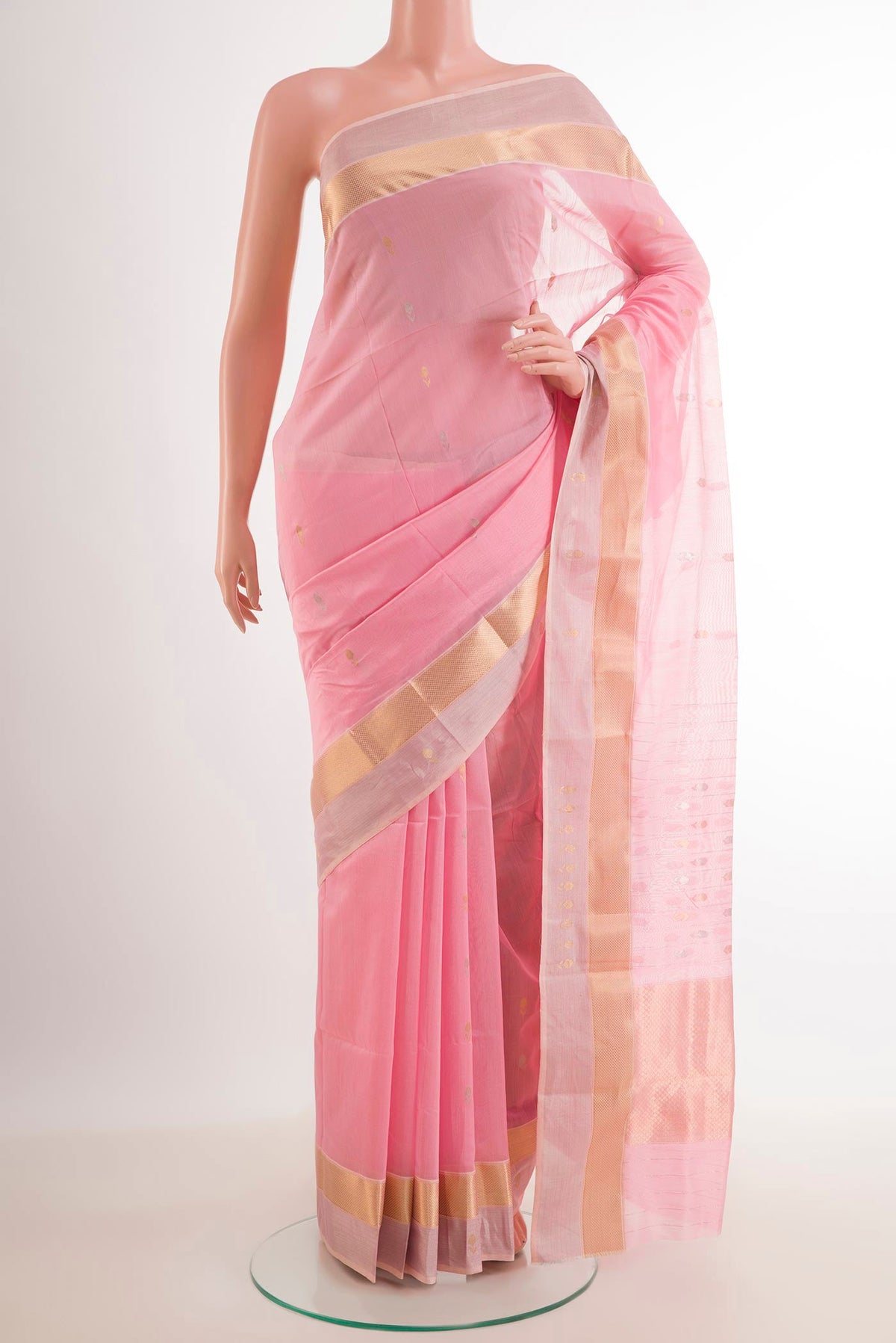 Pink Blended Kora Cotton Saree with Zari Butta on the body and Zari Border.  displayed on a mannequin