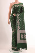 Green Blended Art Silk Saree with Zari Butta on the body and Zari Border.  displayed on a mannequin