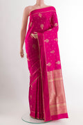 Pink Soft Silk Saree with Zari Butta on the body and Zari Border.  displayed on a mannequin