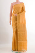 Yellow Tussar Silk Saree with Zari Butta on the body and Zari Border.  displayed on a mannequin