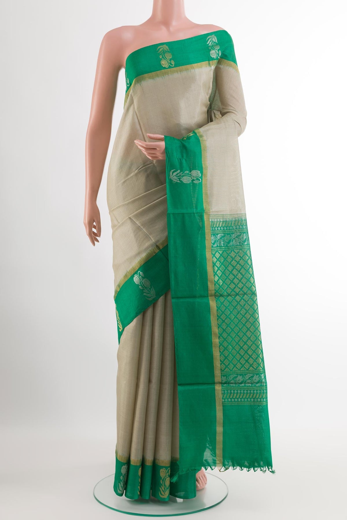 Grey Tussar Silk Saree with Plain Body and Zari Border.  displayed on a mannequin