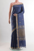 Blue Tussar Saree with Zari Butta on the body and Zari Border.  displayed on a mannequin