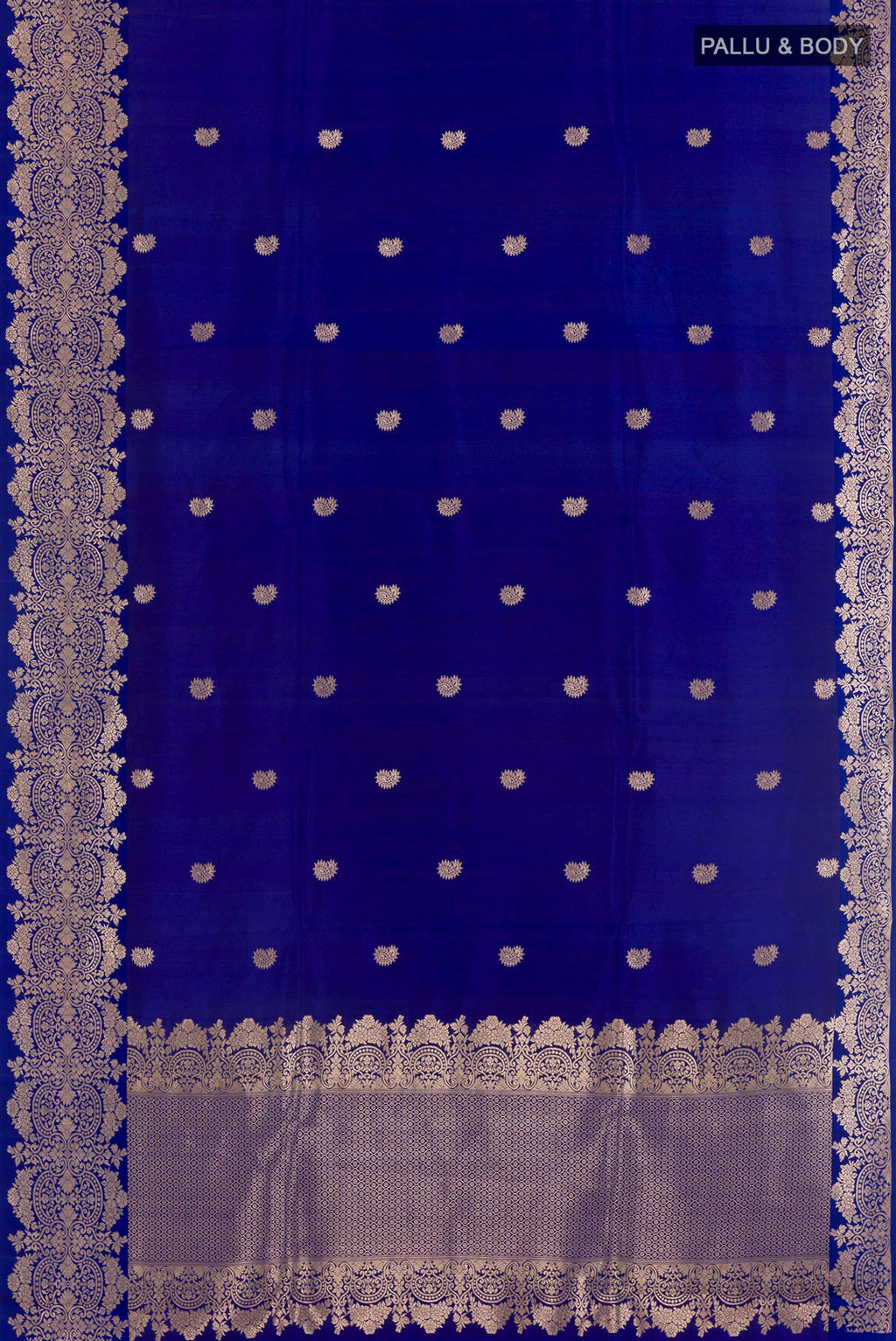 Flat view of Blue Banarasi Katan Silk Saree with Zari Butta on the body and Zari Border. 