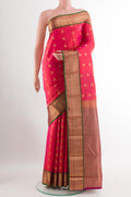 Red Dual Tone Kanjivaram Silk Saree with Zari Butta on the body and Paithani Border.  displayed on a mannequin