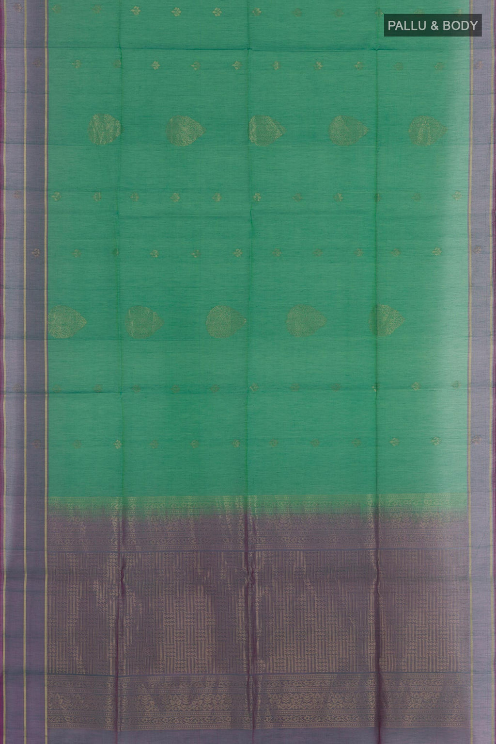 Flat view of Green Blended Kora Cotton Saree with Zari Butta on the body and Zari Border. 