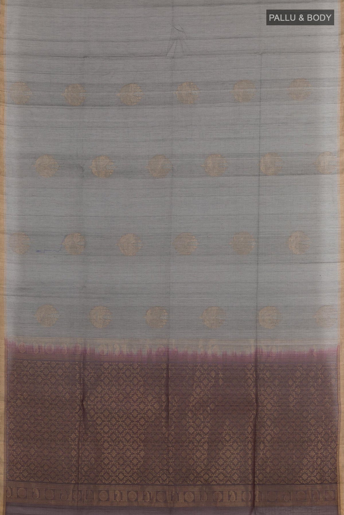 Flat view of Grey Blended Kora Cotton Saree with Zari Butta on the body and Zari Border. 