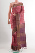Light Magenta Tussar Saree with Thread Butta on the body and Zari Border.  displayed on a mannequin