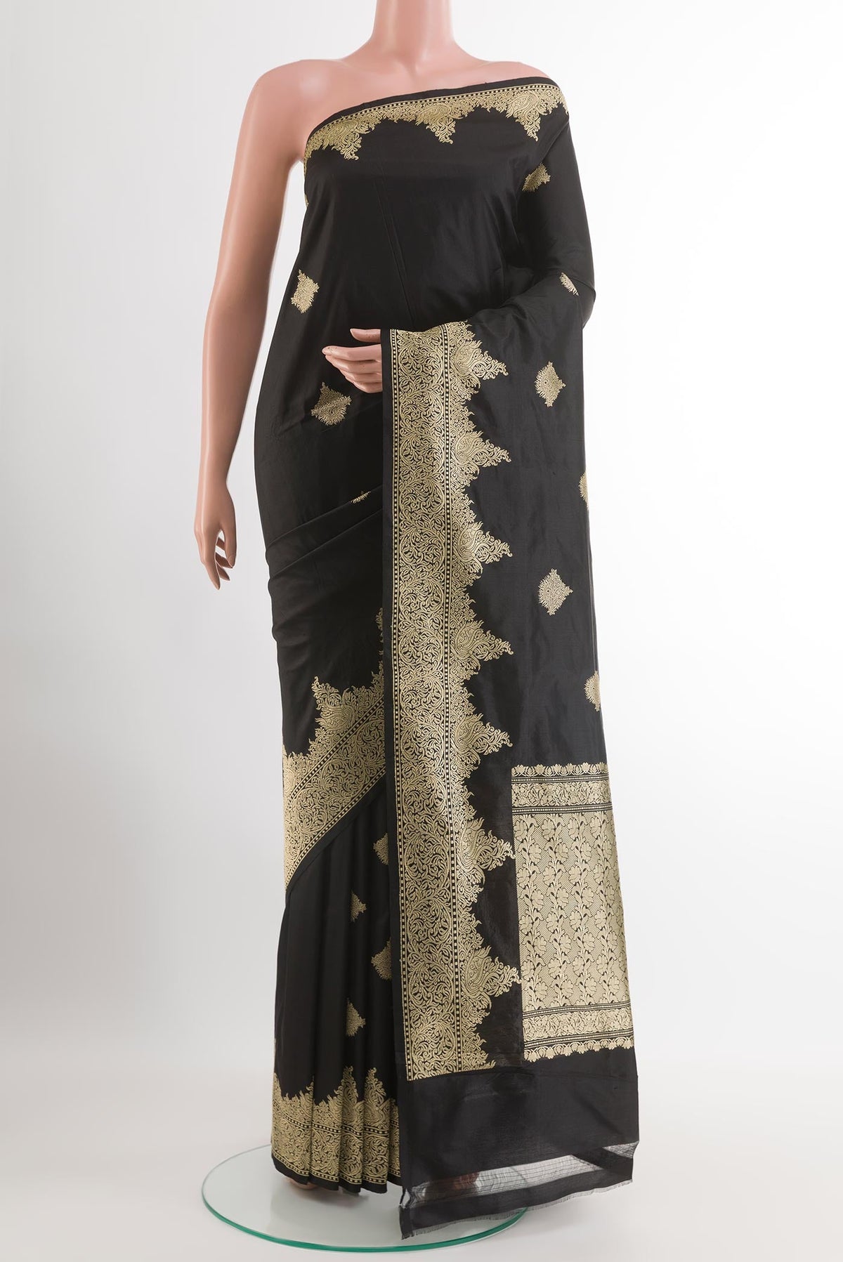 Black Banarasi Katan Silk Saree with Zari Butta on the body and Zari Border.  displayed on a mannequin