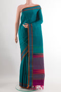 Blue Kanchipuram Silk Saree with Stripes on the body and Thread Embroidery Border.  displayed on a mannequin