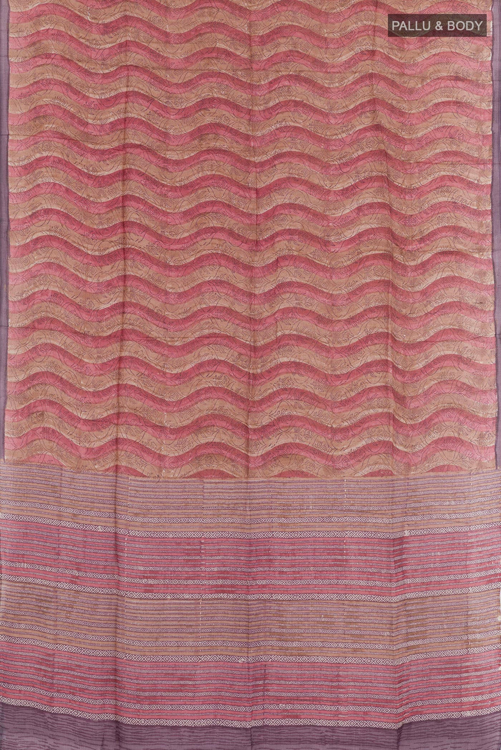 Flat view of Purple Tussar Saree with Printed design on the body and Zari Border. 