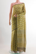 Green Tussar Saree with Printed design on the body and Printed Border.  displayed on a mannequin
