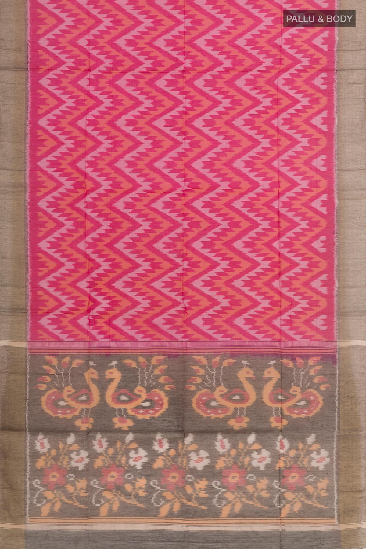 Flat view of Pink Blended Kora Cotton Saree with Ikat design on the body and Zari Border. 