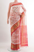 White Kora Cotton Saree with Ikat design on the body and Zari Border.  displayed on a mannequin
